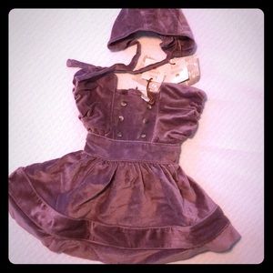 Kate Quinn purple velvet dress and hat.